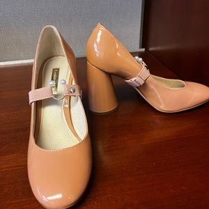 Pale pink block heels